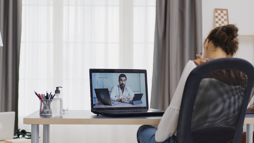 woman-remote-video-call-with-her-doctor-using-tablet-computer_482257-19687